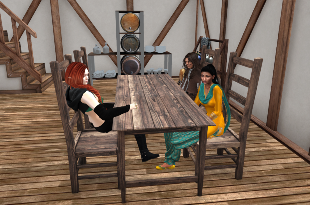 Radulf, Ithildin and Nessa seated at a tavern table